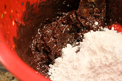 Powdered sugar added to chocolate mixture
