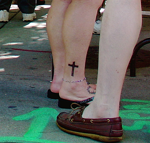 small cross tattoos women