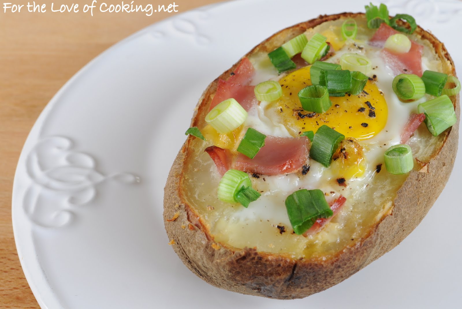 Baked Potato with Egg, Extra Sharp Cheddar, and Canadian Bacon For