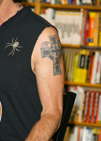 Celtic irish cross tattoo on male's arm and Irish cross tattoo on male's 