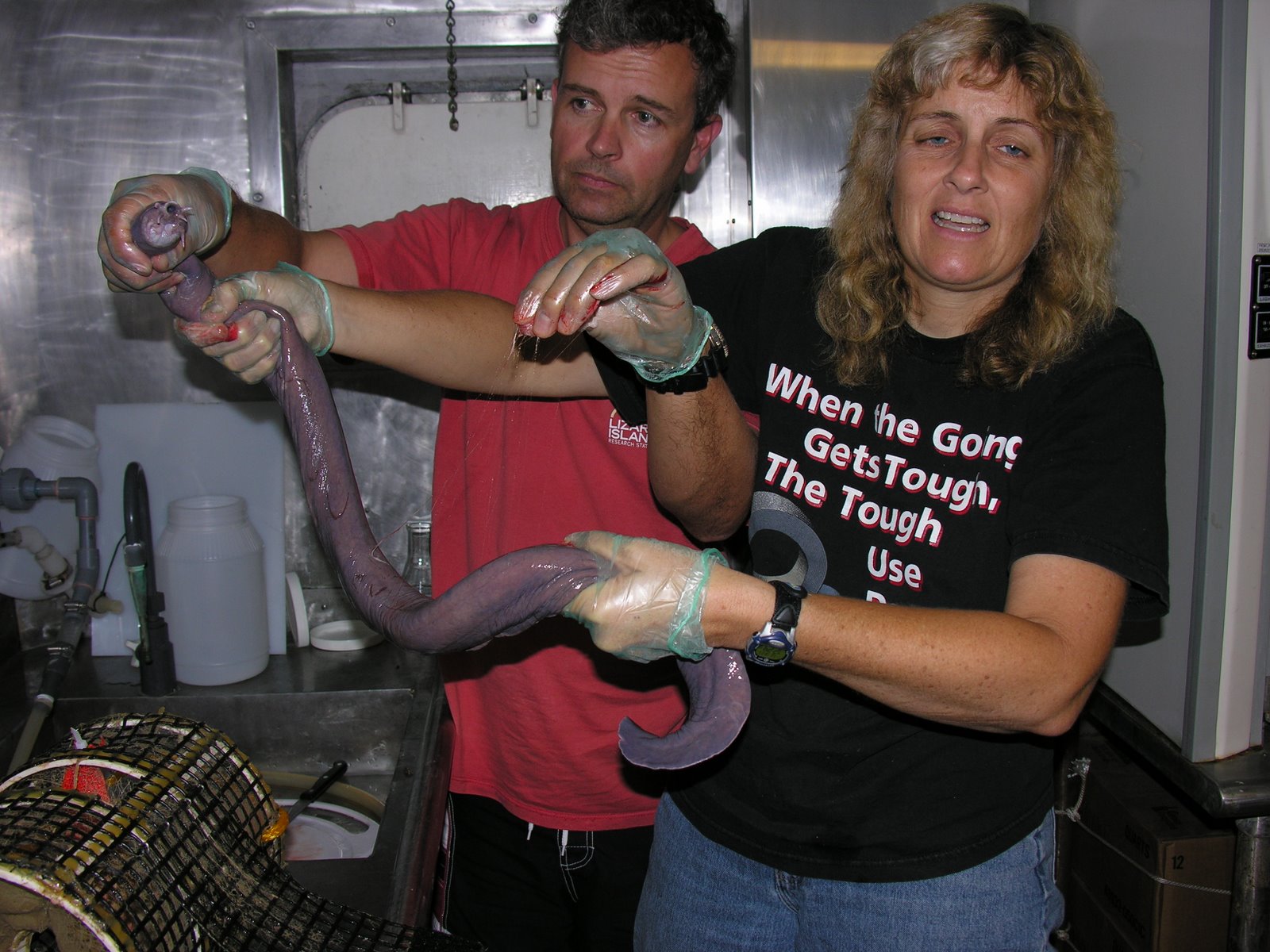 [hagfishandhandlers_NOAA.JPG]