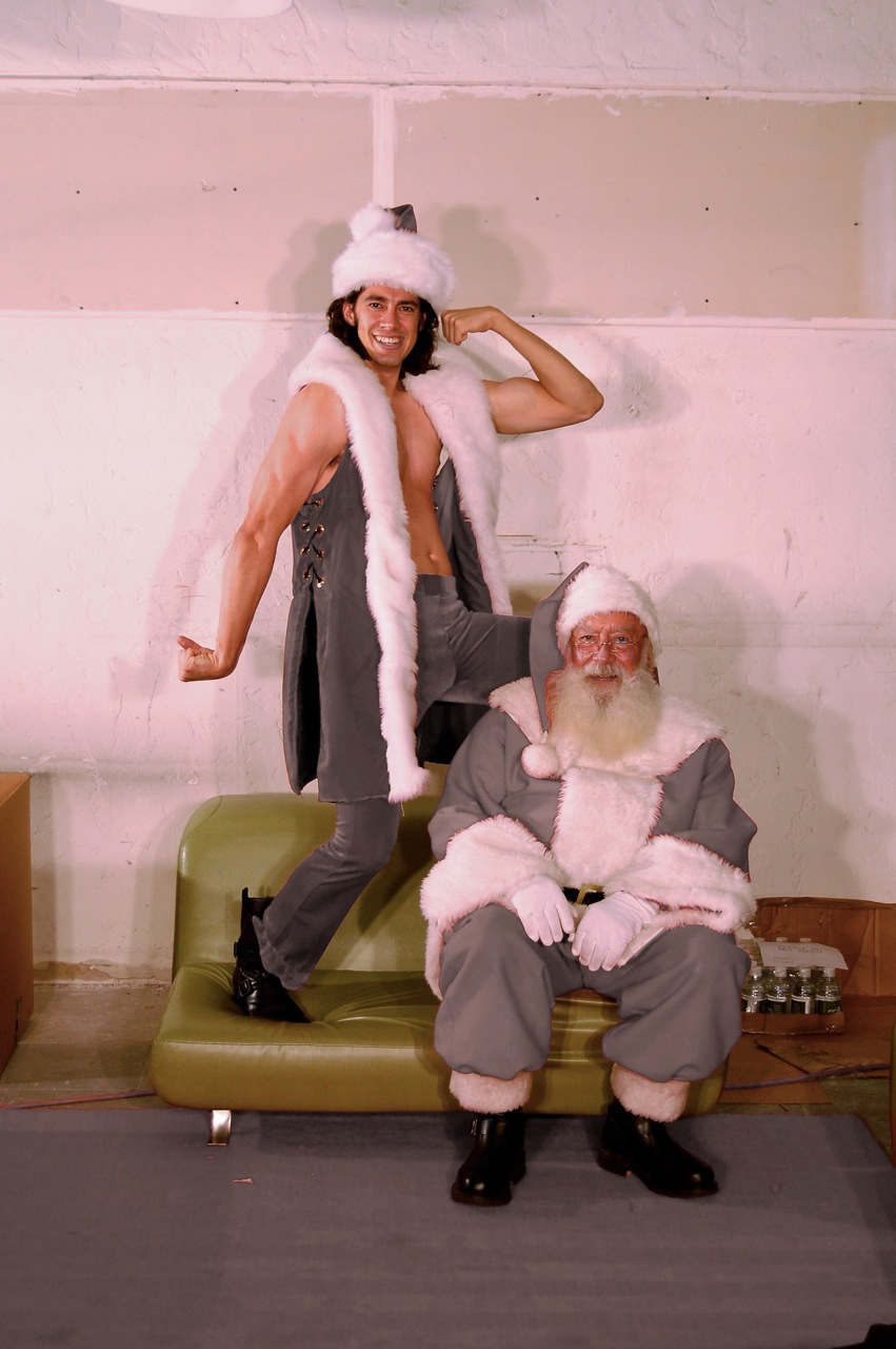 Tormenting Santa â€” Me as Hunky Santa posing with Santa Claus ...