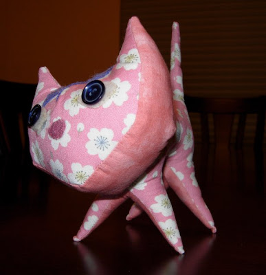 Inscrutable Pink Pointy Kitty