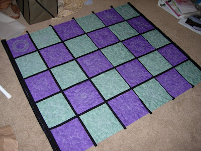 center top of reversible embroidered quilt