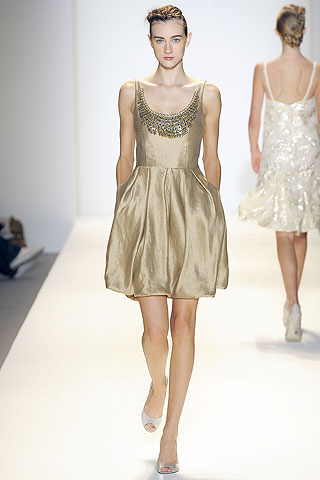 [Lela+Rose+gold+dress+with+bubble+skirt.jpg]