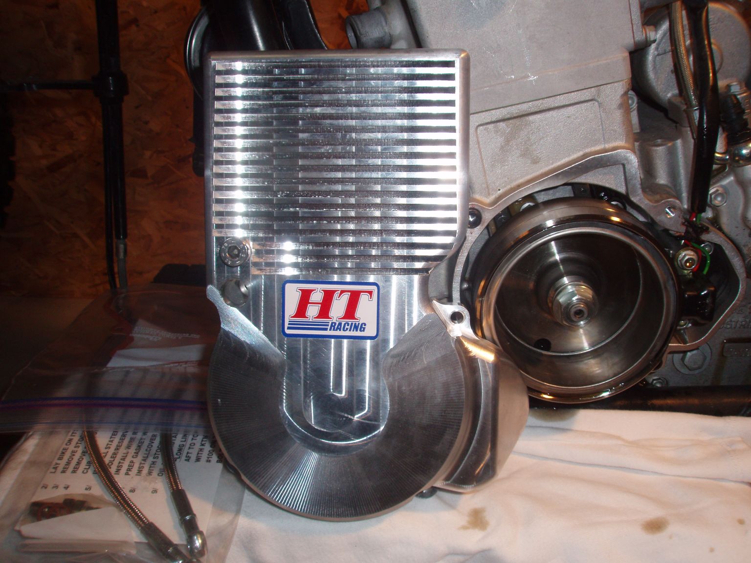 With the HT Oil Cooler the oil capacity is almost 2 quarts. Standard oil capacity is 1.3 quarts of oil.