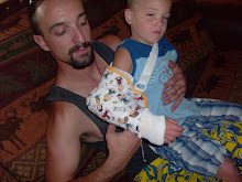 LOOK GRANDMA DEAN AT MY ARM IT HURTS BUT I GOT A CHARLIE BROWN SLING WITH A CAST UNDER IT!!