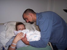 I LOVE THIS PICTURE JEFF IS HANDING ME THE BABY FOR THE FIRST TIME WHAT A SPECIAL MOMENT......