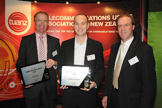 litmos leadership team accepting the award