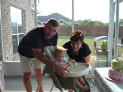 Mom, Dad and I, just before my first taste of CAKE!