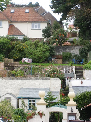 Tiered houses and gardens on a steep slope