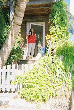 Indianwoman at door.