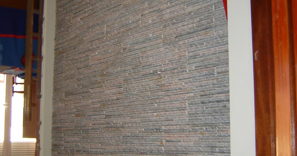 REFORMAS EN GENERAL: PARED Y CHIMENEA FORRADAS DE LASCAS DE PIZARRA Y