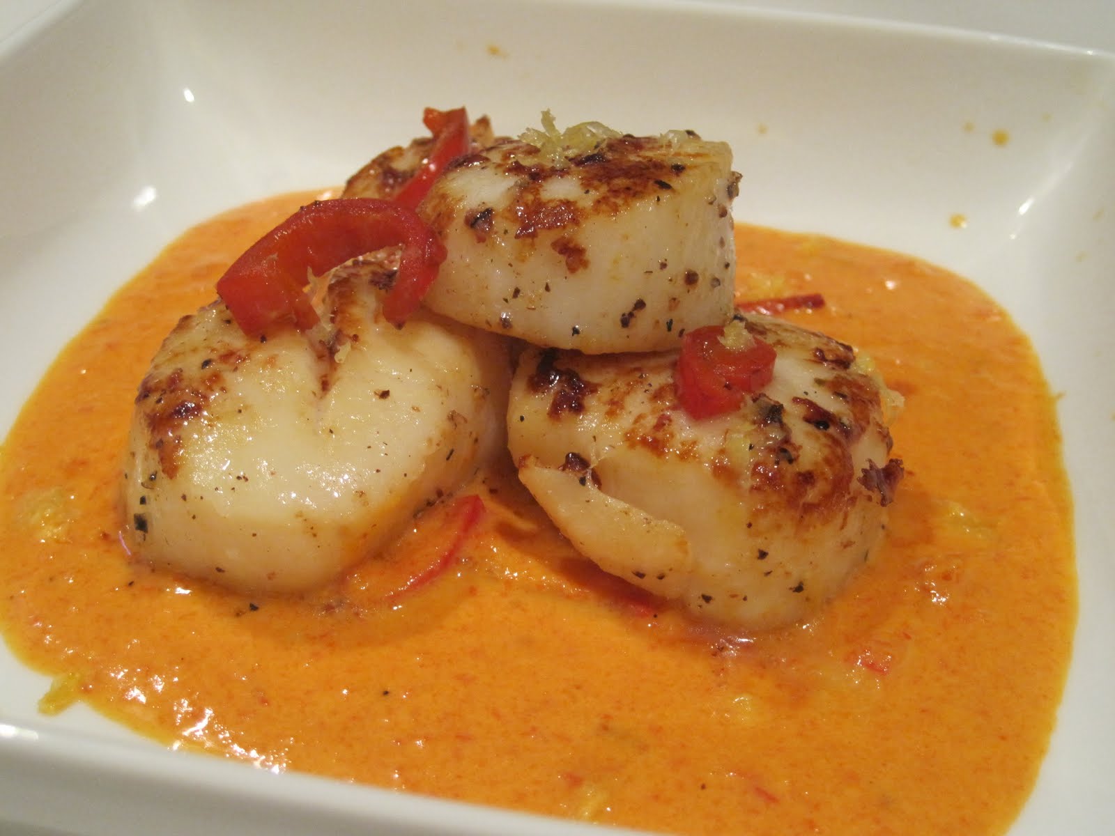 CURIOUS EATS Pan Seared Scallops in a Red Pepper Cream Sauce
