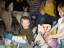 Hayden opening presents with Natalie