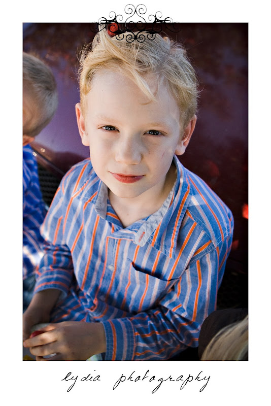 Little boy with a plate of food at lifestyle kids portraits in San Antonio, Texas