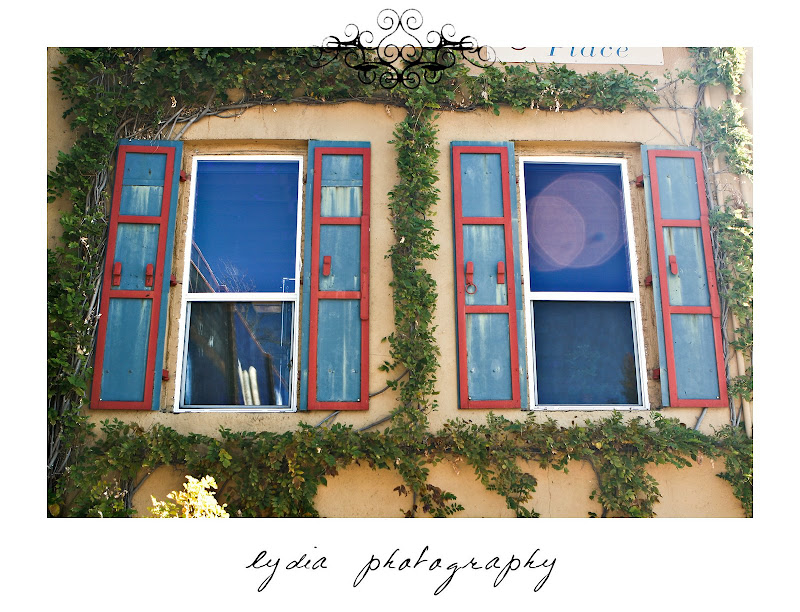 Window colored shutters at lifestyle friends portraits at the old town in Grass Valley, California