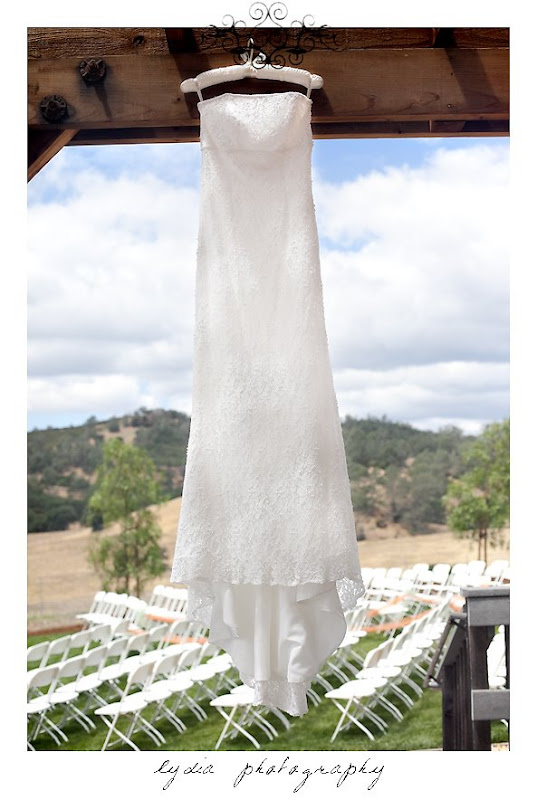 Bride's wedding dressing at modern, citrus, backyard wedding at Pine Ranch in California