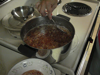 Remove foam from top of jam with a spoon