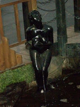 Peeing statue
