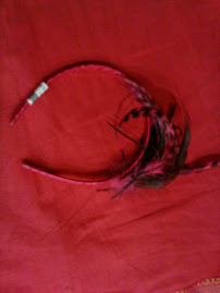 Diadema de plumas fucsia pvp 12€