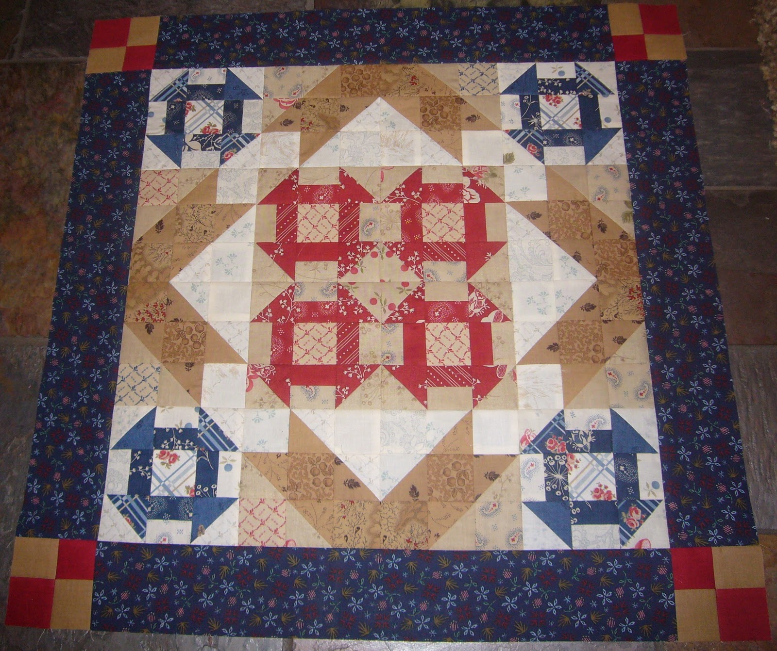 THE QUILTED PINEAPPLE Le Petite Butter Churn