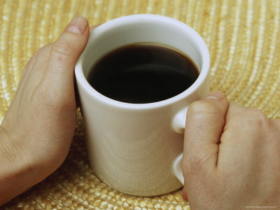 [mug-of-coffee-between-two-hands.jpg]