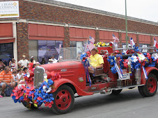 Do all parades begin with an antique fire truck?