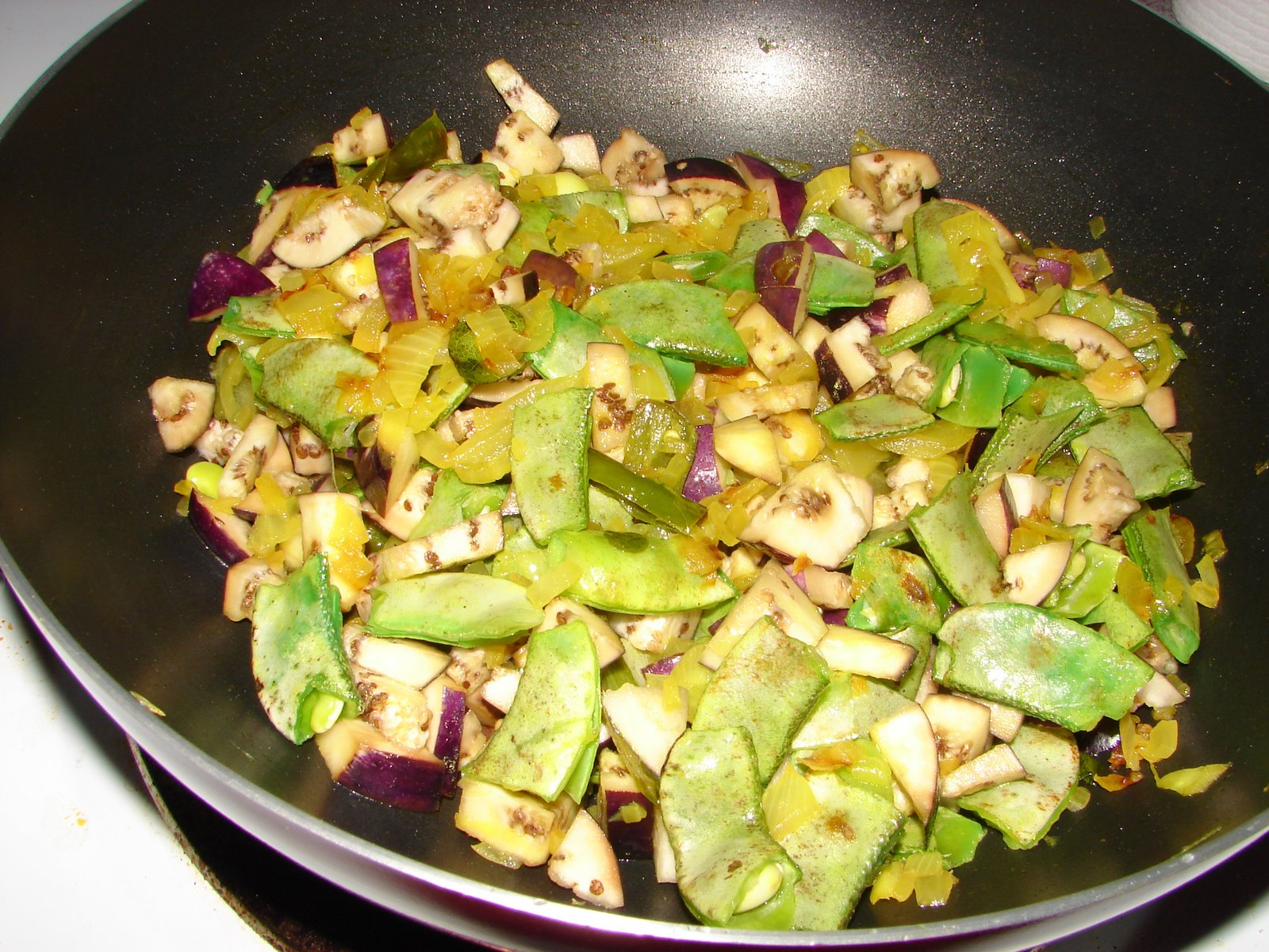 [addingbrinjals.JPG]