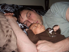Dad is post-call and baby is taking a snooze with him.