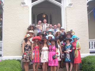 all the men and women at our derby dressed in hats and finery and ready to head to the track. beautiful dresses