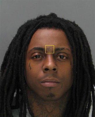 Lil Wayne looks like he got drunk and passed out and his friends drew on his