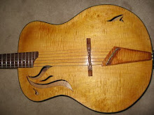 The Stavros Guitar- maple top with traditional tailpiece of curly maple