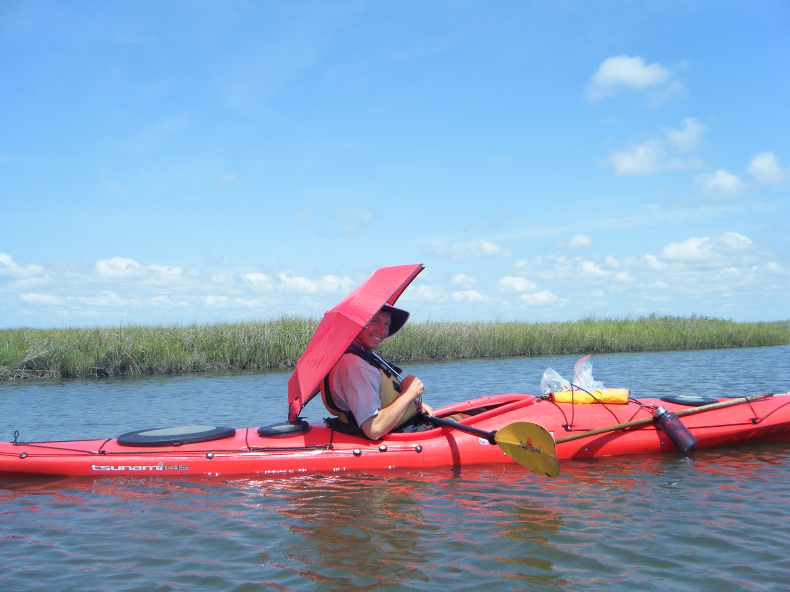 Wayfinder Ali Why you should always bring an umbrella sea kayaking...