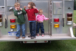 Greta, Gavin & Aidan checking out the firetruck