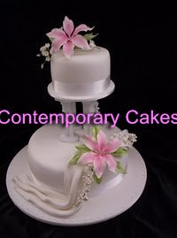 Pillared lily cake with drapes.