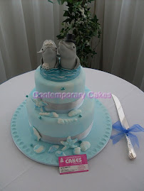 Beach theme with sugar dolphin toppers.