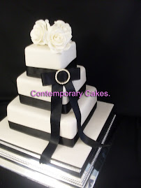 3 tier square black and white theme with sugar roses.