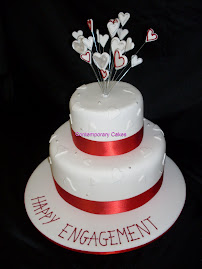 Engagement Party Cake in a red and white theme.