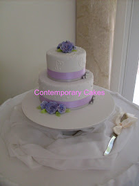 Lilac sugar roses stacked cake.