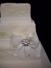 Vintage lace design 3 tier stacked cake.