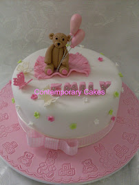 Emilys christening cake, with sugar paste teddy bear and balloons.