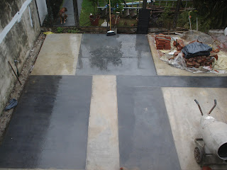 RODRIGUEZ NUMA ARQUITECTURA: Piso de cemento alisado bicolor con junta