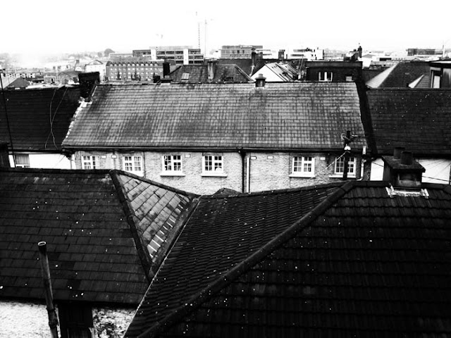 Rooftop views of Cork, Ireland from a bed and breakfast window.
