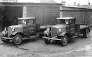 Two 2-ton Morris lorries standing in the brewery yard c1938.