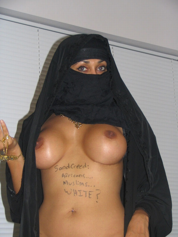 Arab Chick With AK47 Stripping Out Of Her Burka And Showing Her Big Boobs