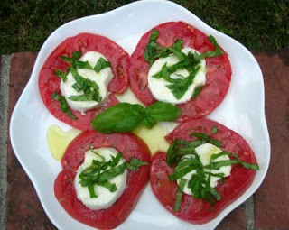 Insalata Caprese, the summer classic, just slices of perfect tomato and fresh mozzarella