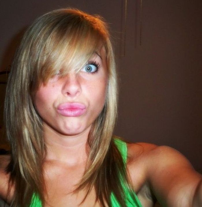 Duck face pose common to Facebo...