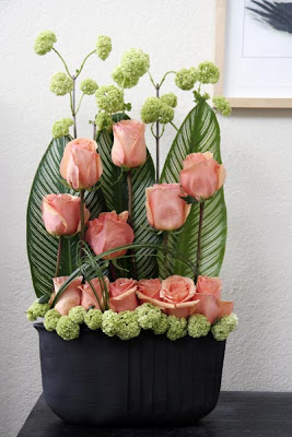 office floral arrangements high end the floral arrangement is placed at reception area on every monday saw big orange roses market and made contemporary style with viburnums tomobi floral art weekly office decoration office floral arrangements high end the floral arrangement is placed at reception area on every monday saw big orange roses market and made contemporary style with viburnums tomobi floral art weekly office decoration