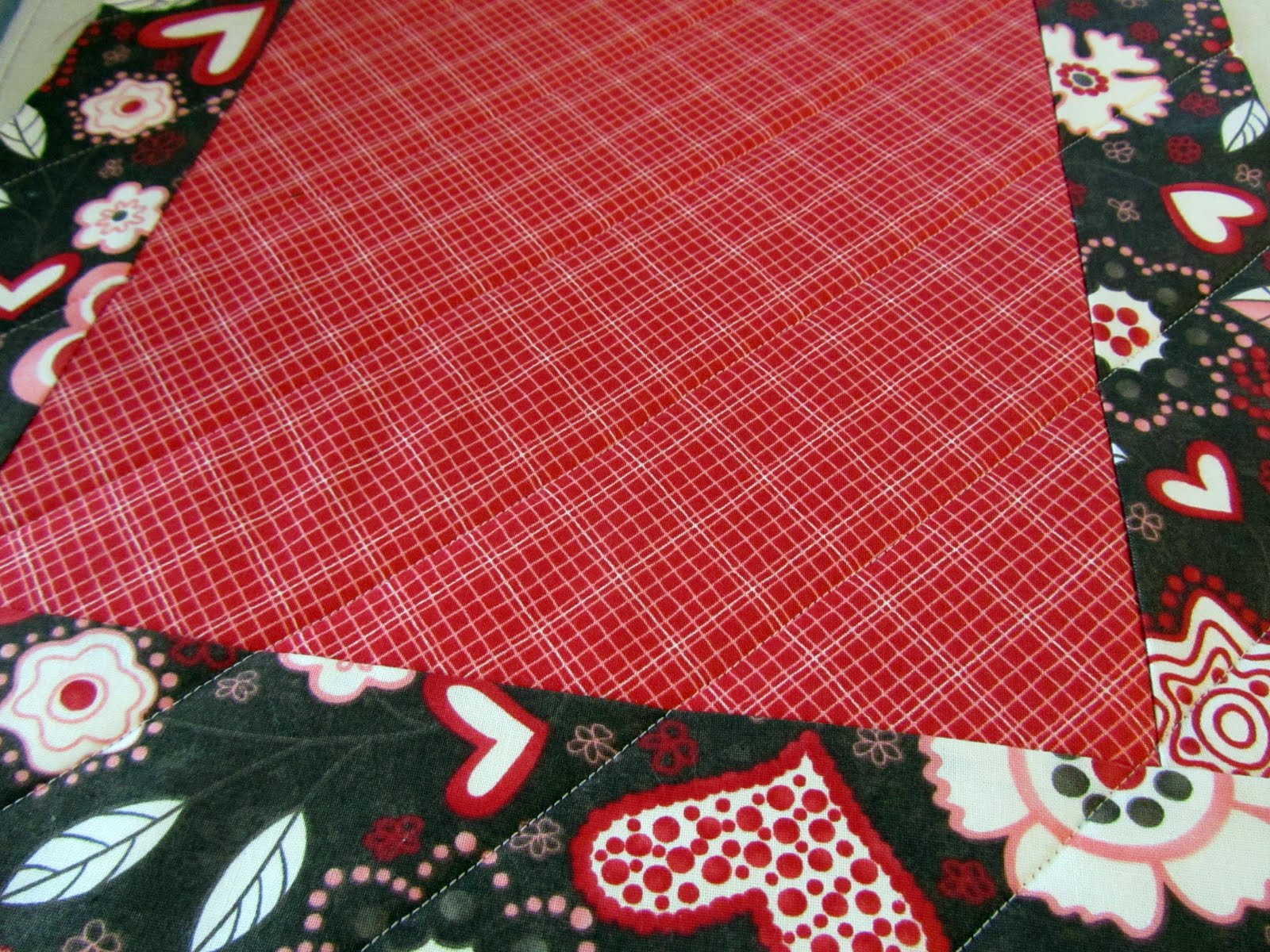 Valentine's day table runner. pattern from kimberbell designs. kit Made With Love: Valentine's Day Reversible Table Runner Tutorial